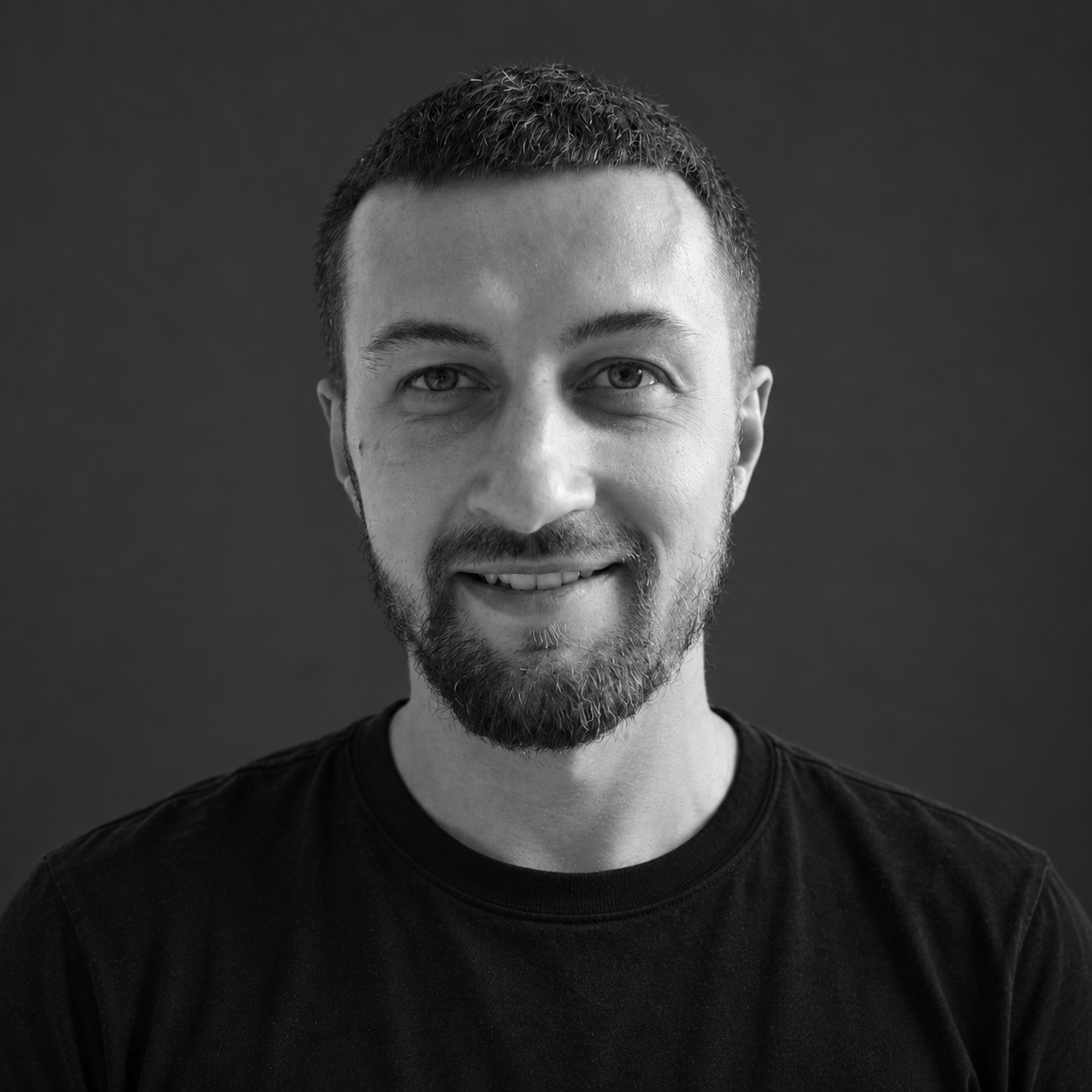Black-and-white portrait of Sergey Shestak